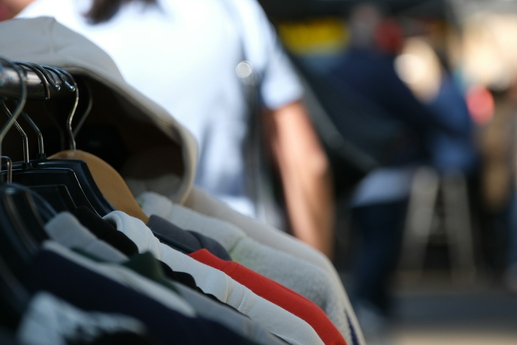 Row of clothes hanging on a rack