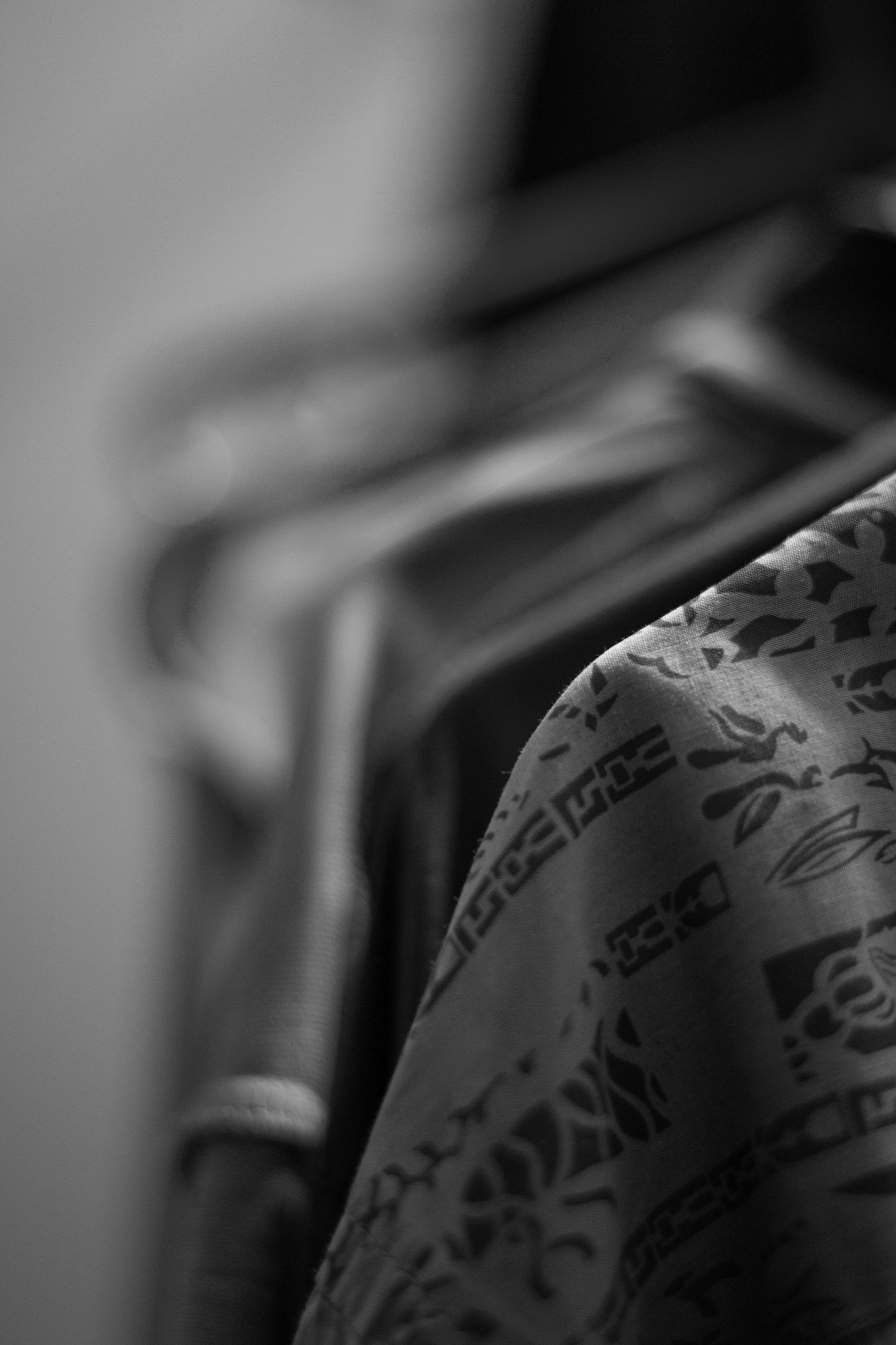 Clothing on a hanger, captured in monochrome.